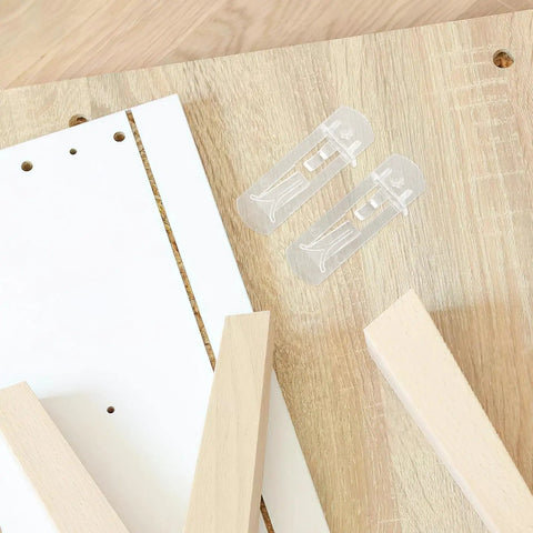 10-Pack Plastic Shelf Pegs For Cabinets And Shelves, Durable ABS Material, shown on wooden surface with assembly panels