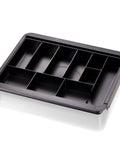 Slick Expandable Drawer Organizer Tray With Adjustable Width And Removable Dividers For Hustle Ready Desk Organization In Smooth Recycled Black Plastic Finish, top view showing separate compartments.