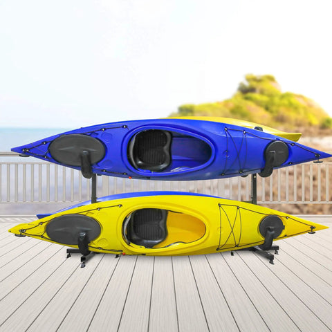 Heavy Duty Freestanding Kayak Rack For Four Kayaks And Boards No Wall Mount Needed Tripod Floor Storage Stand For Indoor Outdoor Garage Shed Dock Adjustable Height Holds Kayaks SUPs And Canoes with two kayaks on a deck.