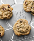 25 Pack 1/4 Size Cookie Sheet Baking Pans 12.8 By 8.9 Inch Heavy Duty Nonstick Aluminum Foil Trays with cookies