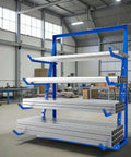 Beefy Industrial Cantilever Rack System For Heavy Duty Storage And Lumber Organization Freestanding Alloy Steel Pipe Rack With Upward Safety Hooks Garage Shed Workshop Storage 4000 LBS Capacity in a warehouse with aluminum pipes.