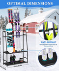 Freestanding Heavy Duty Ski And Snowboard Rack For Garage Storage Holds Four Full Sets Of Gear in winter setting, displaying skis and gear