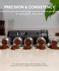 Fino Portable Electric Coffee Grinder With 28 Grind Settings For Espresso To French Press next to ground coffee samples on a counter