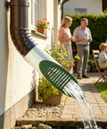 Angled Drainage Grate For Yard And Outdoor Drainage, 4 Inch Emitter Grate With Built In Grille Cover in use on outdoor gutter pipe