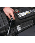 Mechanic using All In One Forty Piece SAE And Metric Socket Set With One Quarter Inch And Three Eighth Inch Drive Ratchet under hood.