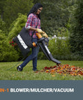 Person using Trivac 3 In 1 Electric Leaf Blower Vacuum Mulcher For Lawn Care With 350 CFM And 210 MPH, Metal Impeller, Reusable Bag Included