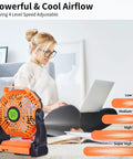 Portable USB Camping Fan With 20000mAh Battery Cordless Rechargeable Personal Fan With LED Light And Hanging Hook shown indoors
