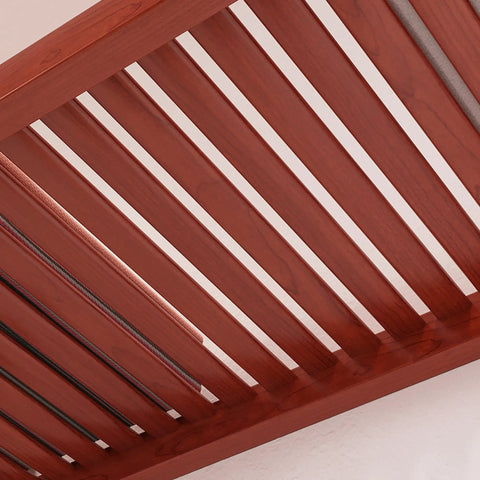 Close-up view of Rock Solid Hardwood Reach In Closet System shelf with rich red mahogany finish and smooth glide rod.