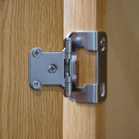 Half Inch Overlay Brushed Nickel Cabinet Hinges 10 Pack Soft-Close Semi-Wrap Face Frame Hinges installed on wood cabinet