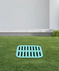 Heavy Duty Square Catch Basin With Grate For Yard Drainage 15.7 x 15.7 In Debris Basket installed in a lawn