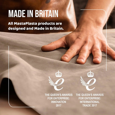 Person's hand touching fabric with text 'Made in Britain' and awards for innovation and trade, showcasing UK-made products.