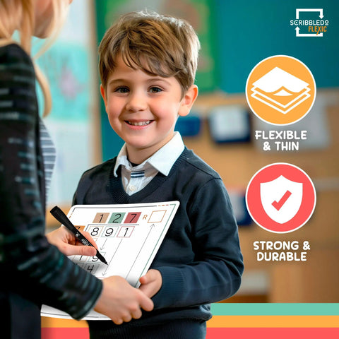 Boy holding Flexible Dry Erase Math Sheets For Long Division Practice 9x12 Whiteboards Pack Of 10 For 3rd Grade Classroom