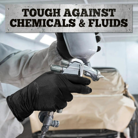 Person wearing Tough As Nails Black Nitrile Work Gloves 6 Mil Heavy Duty Fully Textured Grip while using a spray gun.
