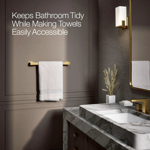 Honesty 18 Inch Towel Bar In Vibrant Brushed Moderne Brass installed on bathroom wall with towel hanging