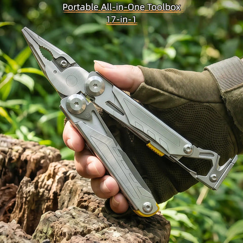 Hand holding 17 In 1 Multitool Pliers With Flint Fire Starter And Carabiner Hammer, 5Cr13 Steel Outdoor EDC Gear in the woods