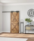 Tall Floor Lamp With Glass Shade In Blackened Bronze And Clear Finish, 55 Inch in a living room with barn door and wall clock.