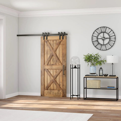 Tall Floor Lamp With Glass Shade In Blackened Bronze And Clear Finish, 55 Inch in a living room with barn door and wall clock.