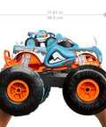 Monster Trucks RC Toy With Transforming Rhinomite, 1:12 Scale Monster Truck And 1:64 Scale Race Ace, held, showcasing size.