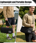 Man carrying Go-To 2-In-1 Foldable Backpack Stool Heavy Duty Portable Seat For Fishing Hiking Picnics And Outdoor Adventures Thickened Collapsible Chair With Crossbody Sling Bag Hands Free Carry Black as a crossbody bag outdoors.