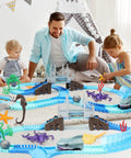 Family playing with Shark Race Track Set With Bendable Cars For Kids Aged 3 To 9, 183 Piece Ocean Themed STEM Playset on carpet
