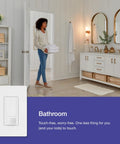 Motion Sensor Light Switch 2 Pack Single Pole Auto On Auto Off For Bathroom Garage Laundry Room Indoor Use Occupancy Vacancy Sensor Works With Any Bulb Type White in a bathroom setup with woman holding towels