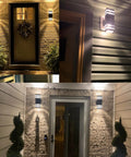 Slick Modern Black Outdoor Wall Light Two Pack Weatherproof Exterior Sconce for house, illuminating porch and entryway.