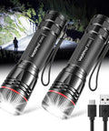 Beast Mode Bright Type C Rechargeable Flashlight With High Lumen Output shown illuminating dark trail, rugged aluminum body.