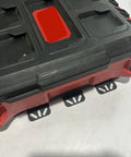 Close-up of a black and red toolbox mounted on a Packout Wall Mounting Plate For Milwaukee Toolboxes Sturdy Metal Base Mounting System