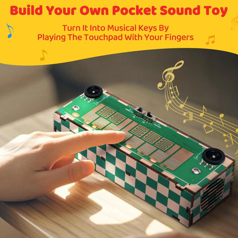 DIY Portable Music Synth Kit With 8 Key Touchpad, Easy 10 Minute Assembly, Intro Instrument For Kids Teens And Adults, STEM Gift For Musicians, Dope Toy For Creative Play And Learning; hand on touchpad