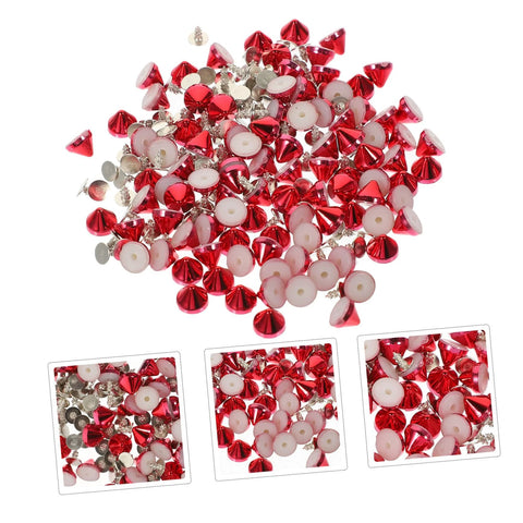 Front view of red plastic craft rivet studs with silver backs for DIY clothing decoration; many pieces.