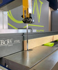 Premium 46 Inch T Track Table Saw Fence Extension With A Bold Five Inch Tall Face attached to bandsaw with wood guide.