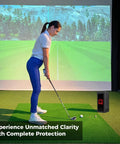 Golfer using Protective Shield Case For Square Golf Launch Monitor indoors, with metal shell and clear acrylic panel in use