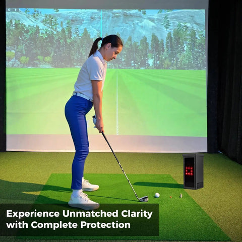 Golfer using Protective Shield Case For Square Golf Launch Monitor indoors, with metal shell and clear acrylic panel in use