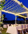 Outdoor wedding setup with tables under 1000 LED Christmas String Lights Outdoor 403 Ft With 8 Lighting Modes IP44 Waterproof Fairy Lights.