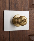Top Grade Stainless Steel Door Lock Reinforcer Plates With Easy Install Adhesive Backing Perfect For Fixing Shaky Handles And Deadbolts While Boosting Home Security Plus Adding A Nice Decor Touch Without Screws Needed At All, stainless steel plate on wood door with brass knob