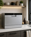 Sleek Compact Countertop Dishwasher With Delay Start And Seven Wash Cycles Portable Kitchen Essential Featuring Stainless Steel Interior Six Place Setting Capacity No Sweat Hookup And Led Digital Display Silver in modern kitchen setting.