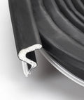 Close-up of Heavy Duty Weather Stripping Seal For Doors And Windows 26 Feet Black Foam Tape with kerf installation detail
