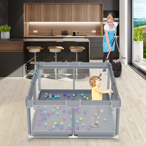 Ultra Safe Big Baby Playpen For Babies And Toddlers Indoor Outdoor Gate with child playing, grey play yard with breathable mesh.