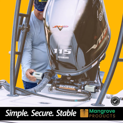 Man installing 4 Inch Hydraulic Outboard Steering Lock For Trailering And Boating, Steer Support For Boat Motors, on boat engine.