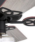 Close-up of matte black hardware and reversible weathered oak blades on a Vintage Style LED Ceiling Fan With Light, 52 Inch Matte Black Ceiling Fan With Clear Glass Schoolhouse Shade, Reversible Weathered Oak And Walnut Blades, Large Room Ready Up To 225 Sq Ft, Combo Mount.