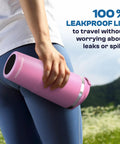 Slick 30 Oz Double Wall Insulated Tumbler Locks Temperature On Coffee Or Soda All Damn Day Long Baby Blue Stainless Steel Mug With Secure Lid held by a person in athletic wear outdoors.