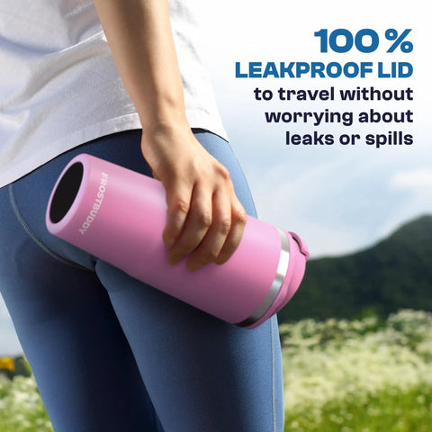 Slick 30 Oz Double Wall Insulated Tumbler Locks Temperature On Coffee Or Soda All Damn Day Long Baby Blue Stainless Steel Mug With Secure Lid held by a person in athletic wear outdoors.