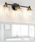 Three Light Black Brass Vanity Fixture With Clear Striped Glass Shades E26 Base Mounts Over Mirror Vintage Yet Modern Bathroom Lighting That Adds Dope Everyday Style And Classic Vibe