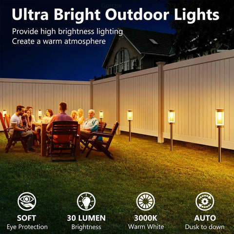Eight Pack Solar Pathway Lights Outdoor LED Waterproof 3000K Tungsten Filament Bulbs For Lawn Garden Driveway Walkways And Patios, Bright Landscape Lighting That Transforms Yards, shown illuminating a backyard gathering.