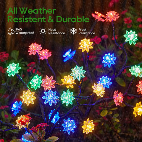 Solar Garden Lights Outdoor Decor 4 Pack With Constant And Flashing Modes, colorful flowers highlighting waterproof durability.