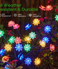Solar Garden Lights Outdoor Decorative Six Pack Multicolor LED Flower Stakes waterproof display in rain