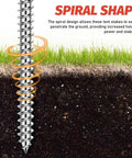 Close-up of a metal tent stake with a spiral shape penetrating the ground for the Rock Solid Heavy Duty Metal Tent Stakes Set.