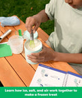 Child using Science Of Cooking Ice Cream Kit For Kids: DIY Hands On Kitchen Chemistry Project at a wooden table.