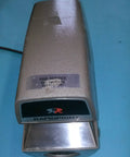 Rock Solid Electronic Time And Date Stamper Running On Standard 110 Volt 60 Hertz Current For Daily Office Grind With Straight Up Reliable Instant Printing And Zero Hassle Desk Operation top view.