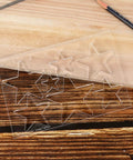 Kickass Star Router Jig Template Clear Hardened Acrylic Inlay Guide For Woodworking showing multiple star shapes on a work surface.